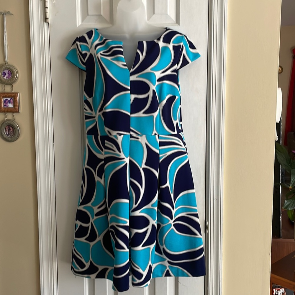 Used 12 Sandra Darren cap sleeved blue, white and silver dress
